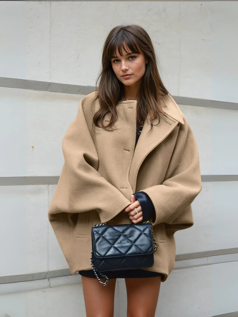 Μονόχρωμο oversized παλτό με κουμπιά τσέπης