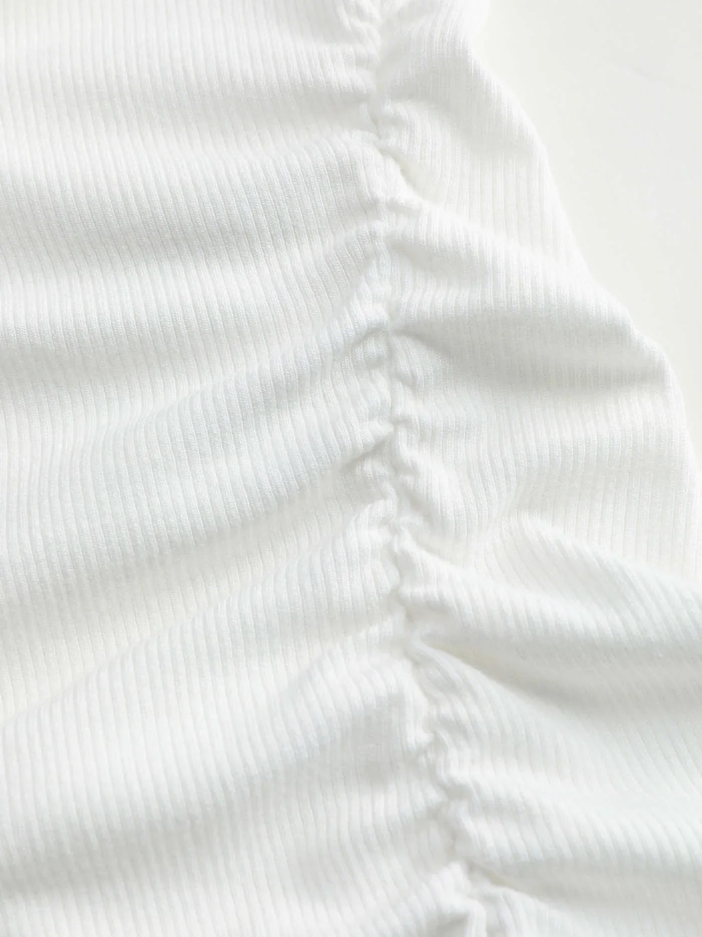 Μονόχρωμο τοπ με ασύμμετρη λαιμόκοψη και μακριά μανίκια - LA FEMME WANDERER